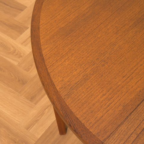 Swedish round dining table in walnut and teak by Ulferts