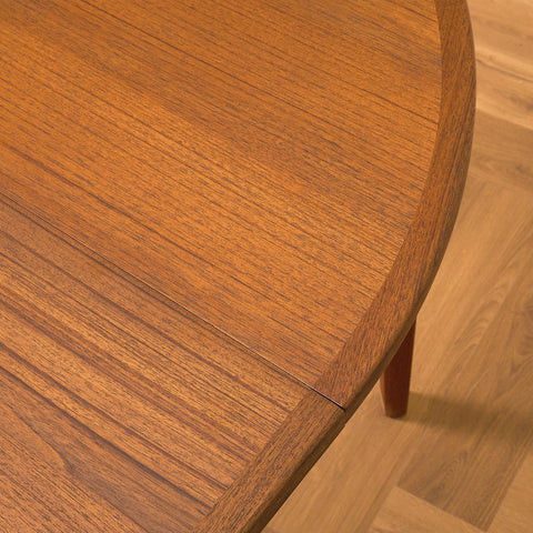Swedish round dining table in walnut and teak by Ulferts
