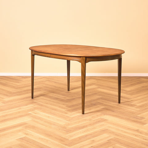 Swedish oval dining table in walnut and beech by Svante Skogh, model "Vindö"