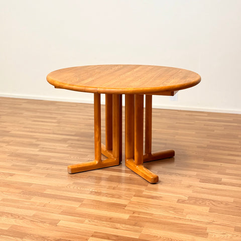 Danish round dining table in elm