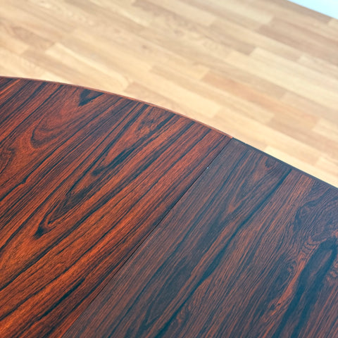 Danish round dining table in Santos rosewood