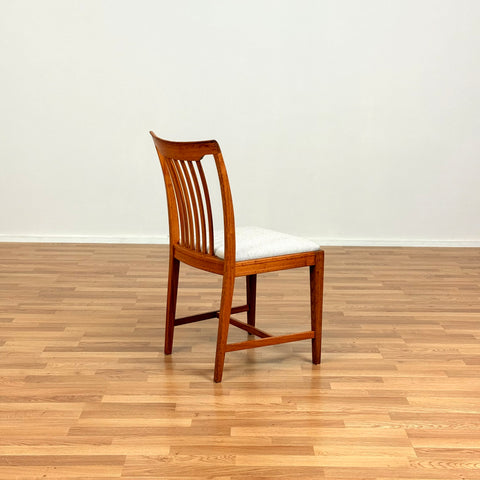 Swedish dining chairs in walnut by Svante Skogh