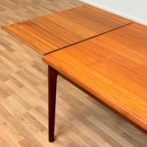 Danish dining table in teak by Henning Kjærnulf for Vejle furniture factory