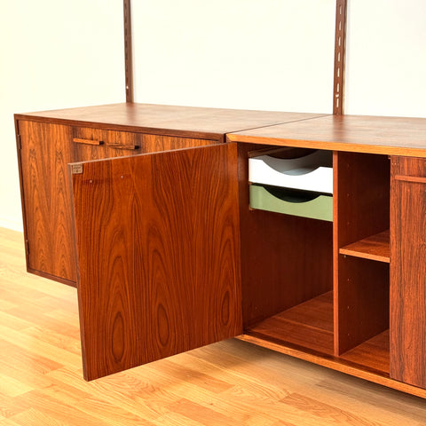 Danish wall unit in Santos rosewood by Kai Kristiansen, for FM Mobler