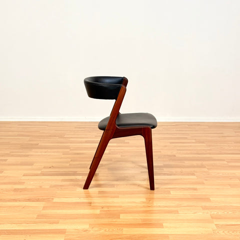 Danish dining chairs in walnut by Kai Kristiansen