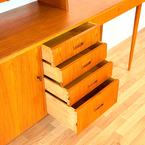 Reserved Swedish bookshelf with writing desk in teak