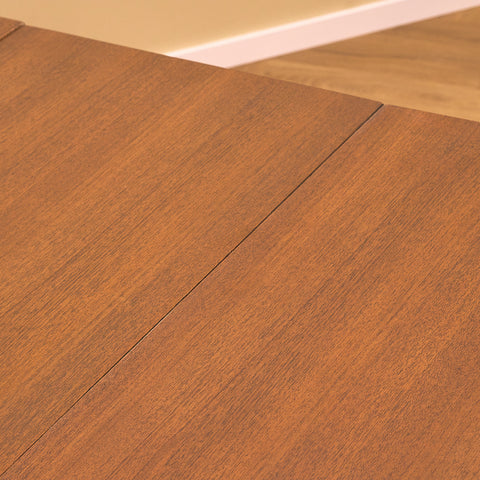 Danish dining table with 4 extensions in teak "Arne Vodder style"