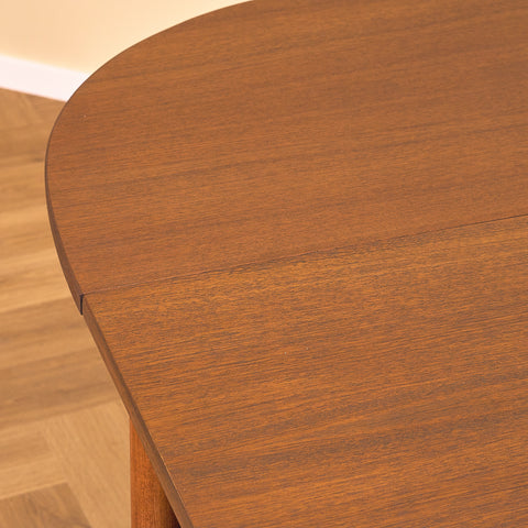 Danish dining table with 4 extensions in teak "Arne Vodder style"