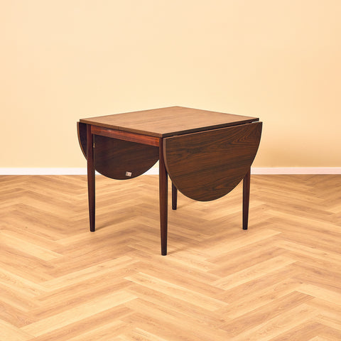 Danish dining table with 4 extensions in Santos rosewood "Arne Vodder style"