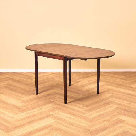Danish dining table with 4 extensions in Santos rosewood "Arne Vodder style"