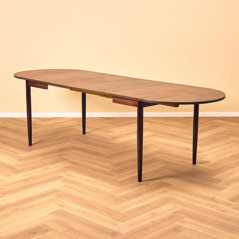 Danish dining table with 4 extensions in Santos rosewood "Arne Vodder style"