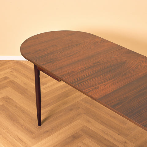 Danish dining table with 4 extensions in Santos rosewood "Arne Vodder style"