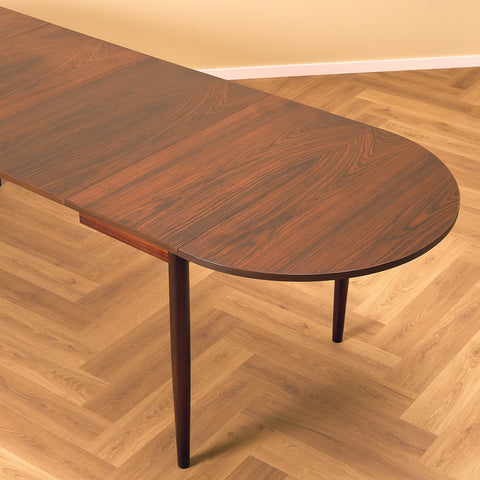 Danish dining table with 4 extensions in Santos rosewood "Arne Vodder style"