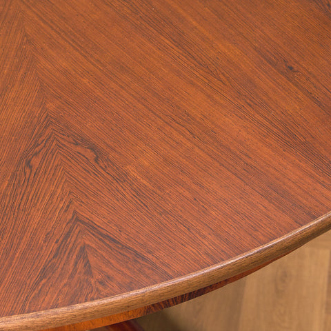 German round dining table in Santos rosewood by Rincklake van Endert