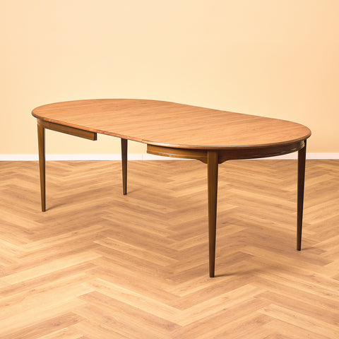 Swedish round dining table in walnut by Svante Skogh, model "Vindö"