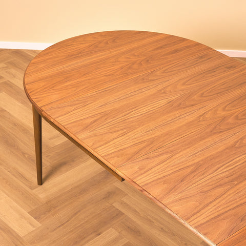 Swedish round dining table in walnut by Svante Skogh, model "Vindö"