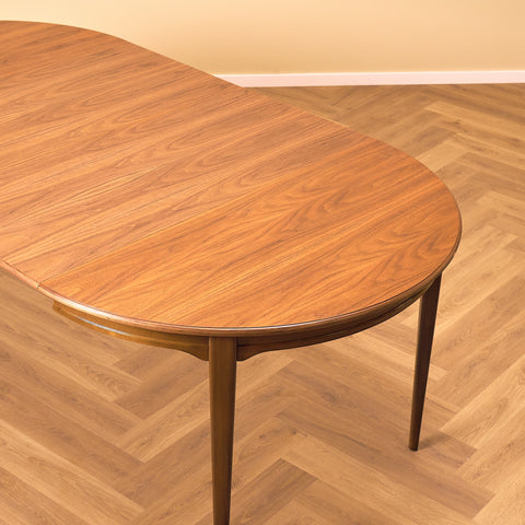 Swedish round dining table in walnut by Svante Skogh, model "Vindö"