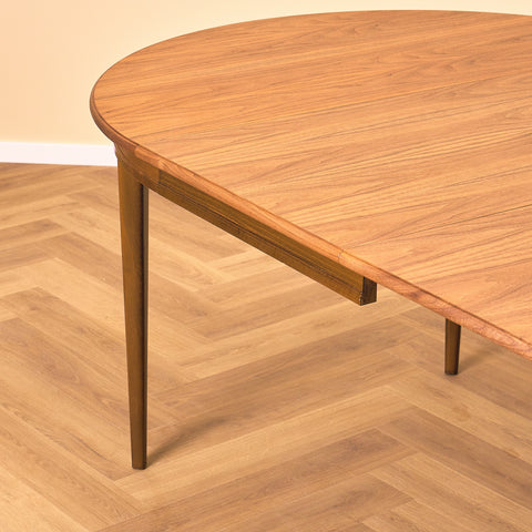 Swedish round dining table in walnut by Svante Skogh, model "Vindö"