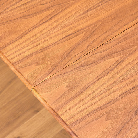 Swedish round dining table in walnut by Svante Skogh, model "Vindö"