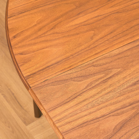 Swedish round dining table in walnut by Svante Skogh, model "Vindö"