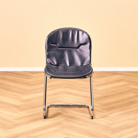 Mid-century dining chairs in chrome and leather