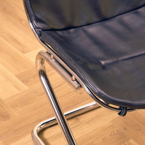 Mid-century dining chairs in chrome and leather