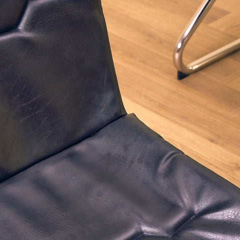 Mid-century dining chairs in chrome and leather
