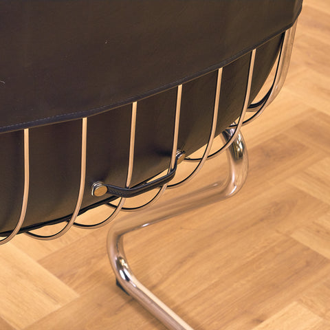 Mid-century dining chairs in chrome and leather