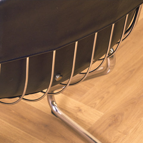 Mid-century dining chairs in chrome and leather