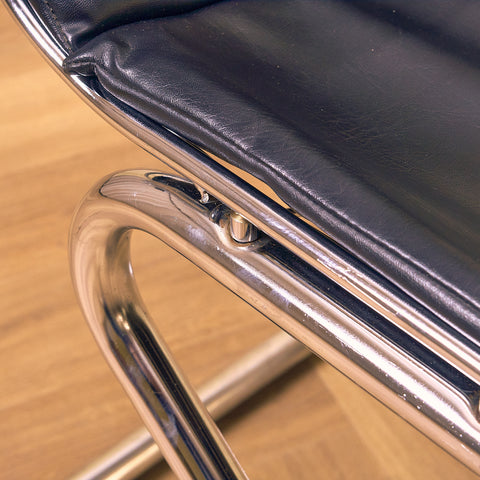 Mid-century dining chairs in chrome and leather