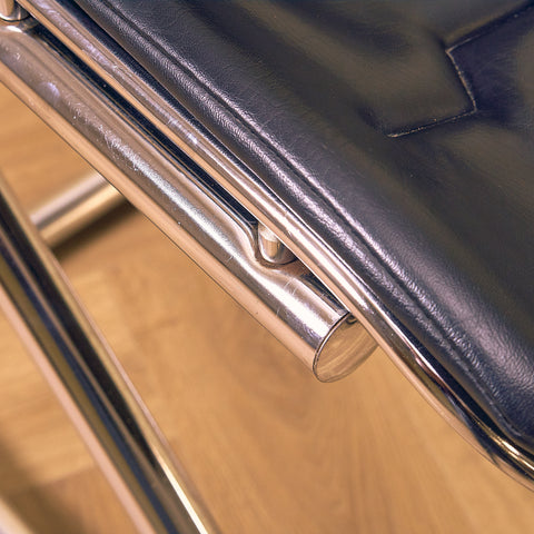 Mid-century dining chairs in chrome and leather