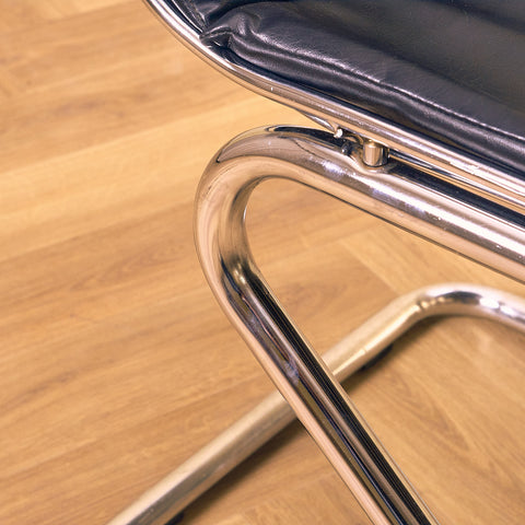 Mid-century dining chairs in chrome and leather