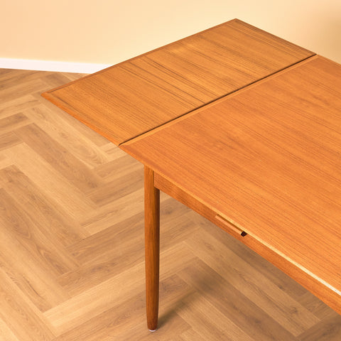 Danish square dining table in teak