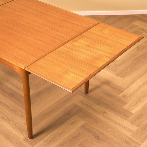 Danish square dining table in teak