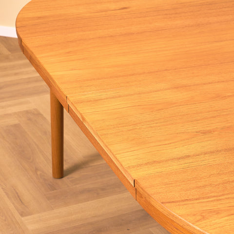 Swedish round dining table in teak