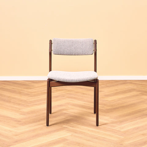 Danish dining chairs in solid walnut by Erik Buch