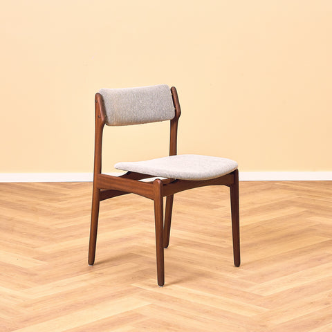 Danish dining chairs in solid walnut by Erik Buch