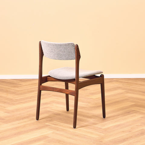 Danish dining chairs in solid walnut by Erik Buch