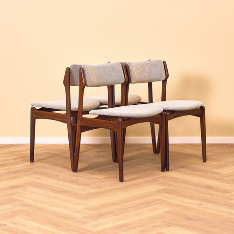 Danish dining chairs in solid walnut by Erik Buch