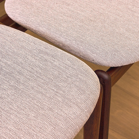Danish dining chairs in solid walnut by Erik Buch