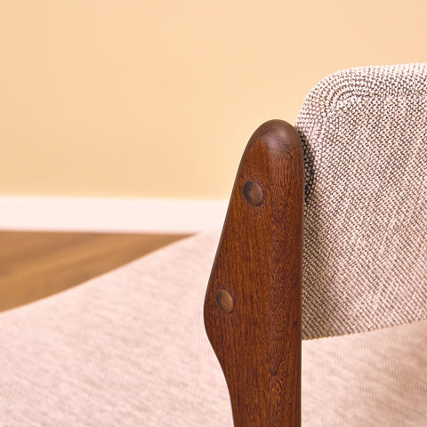 Danish dining chairs in solid walnut by Erik Buch