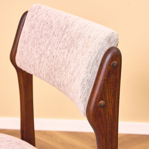 Danish dining chairs in solid walnut by Erik Buch
