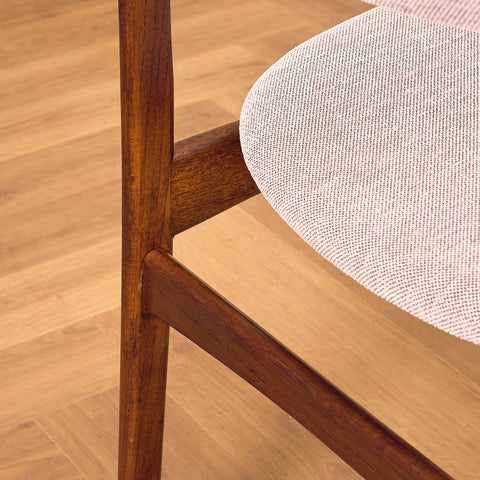 Danish dining chairs in solid walnut by Erik Buch
