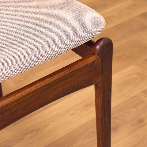 Danish dining chairs in solid walnut by Erik Buch