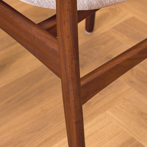 Danish dining chairs in solid walnut by Erik Buch