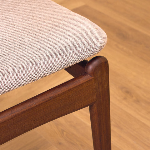 Danish dining chairs in solid walnut by Erik Buch