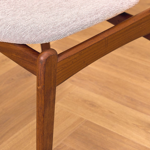 Danish dining chairs in solid walnut by Erik Buch