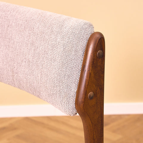 Danish dining chairs in solid walnut by Erik Buch
