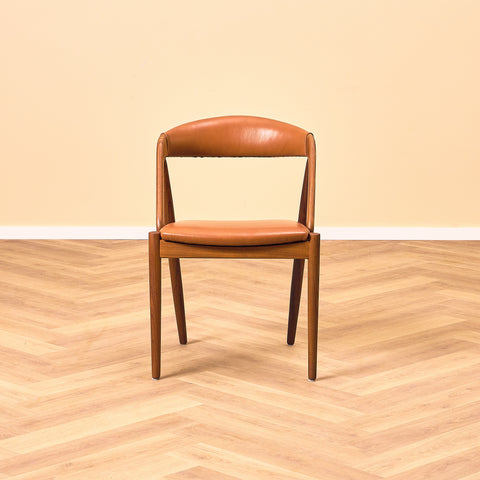 Danish dining chairs in walnut by Kai Kristiansen for Schou Andersen, model 31