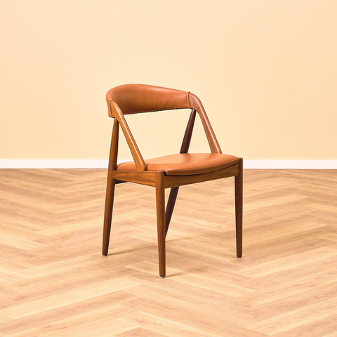 Danish dining chairs in walnut by Kai Kristiansen for Schou Andersen, model 31